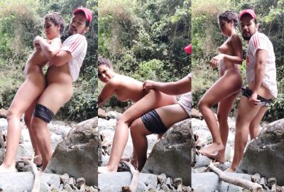 Romantic outdoor sex on the edge of a stream in a jungle