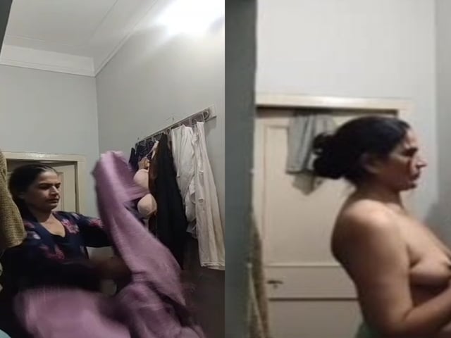 Mom changing dress caught on camera by horny son